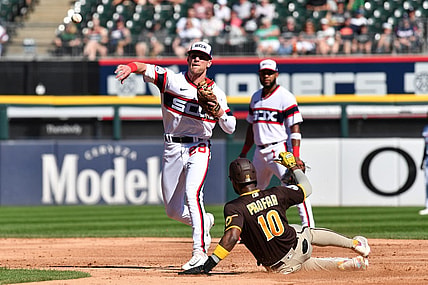 Oct 1, 2023; Chicago, Illinois, USA; Chicago White Sox second baseman Zach Remillard (28) completes a double play while forcing out San Diego Padres left fielder Jurickson Profar (10) during the second inning at Guaranteed Rate Field. Mandatory Credit: Patrick Gorski-USA TODAY Sports