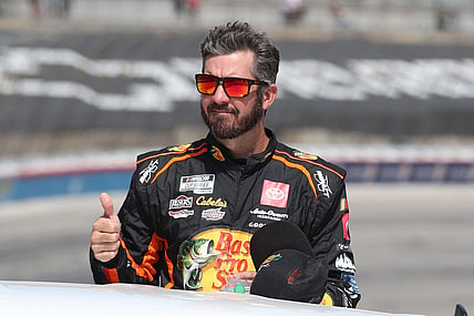 Sep 24, 2023; Fort Worth, Texas, USA;  NASCAR Cup Series driver  Martin Truex Jr. (19) during driver introductions before the AutoTrader EcoPark Automotive 400 at Texas Motor Speedway. Mandatory Credit: Michael C. Johnson-USA TODAY Sports