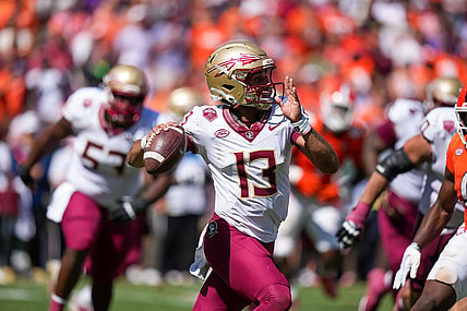 Sep 23, 2023; Clemson, South Carolina, USA; Florida State Seminoles quarterback Jordan Travis (13) in the second half against the Clemson Tigers at Memorial Stadium. Mandatory Credit: David Yeazell-USA TODAY Sports