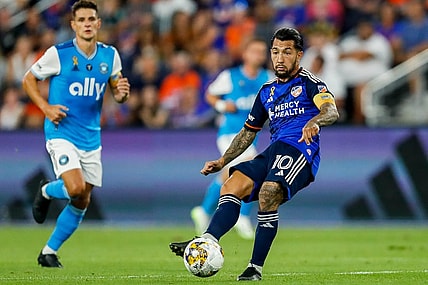 Sep 23, 2023; Cincinnati, Ohio, USA; FC Cincinnati midfielder Luciano Acosta (10) dribbles against Charlotte FC in the first half at TQL Stadium. Mandatory Credit: Katie Stratman-USA TODAY Sports
