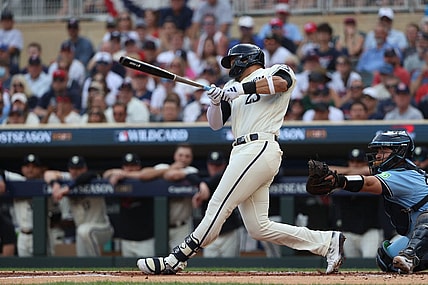 Oct 3, 2023; Minneapolis, Minnesota, USA; Minnesota Twins short stop Royce Lewis (23) hits a two-run home run in the first inning against the Toronto Blue Jays during game one of the Wildcard series for the 2023 MLB playoffs at Target Field. Mandatory Credit: Jesse Johnson-USA TODAY Sports
