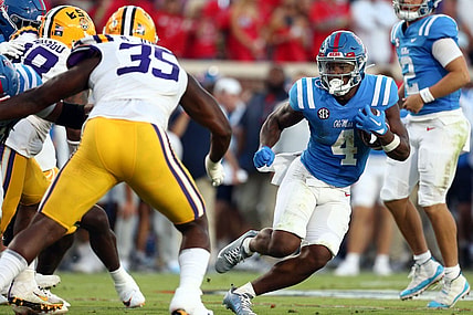 Sep 30, 2023; Oxford, Mississippi, USA; Mississippi Rebels running back Quinshon Judkins (4) runs the ball  during the first half against the LSU Tigers at Vaught-Hemingway Stadium. Mandatory Credit: Petre Thomas-USA TODAY Sports