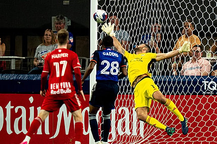 New York Red Bulls forward Elias Manoel (11) ball gets passed FC Cincinnati goalkeeper Alec Kann (1) for a goal in the first half of the MLS match between FC Cincinnati and New York Red Bulls at TQL Stadium in Cincinnati on Wednesday, Oct. 4, 2023.