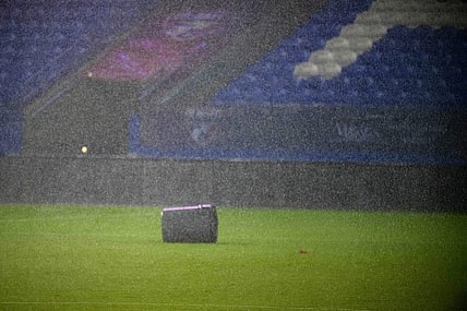 Oct 4, 2023; Frisco, Texas, USA; A view of a trash can after it is blown on to the field as a storm goes through Frisco during a lightning delay in the game between FC Dallas and the Colorado Rapids at Toyota Stadium. Mandatory Credit: Jerome Miron-USA TODAY Sports