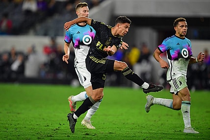 Oct 4, 2023; Los Angeles, California, USA; Los Angeles FC midfielder Filip Yavorov Krastev (50) moves in for a shot on goal against Minnesota United during the second half at BMO Stadium. Mandatory Credit: Gary A. Vasquez-USA TODAY Sports