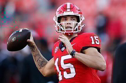 Georgia quarterback Carson Beck (15) warms up before the start of a NCAA college football game against Kentucky in Athens, Ga., on Saturday, Oct. 7, 2023.