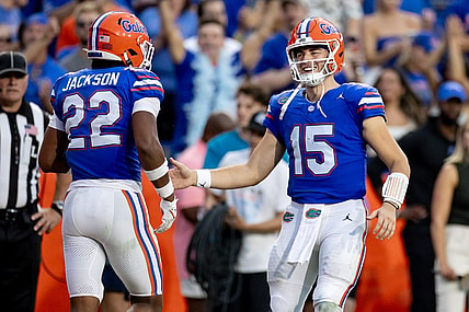 Florida Gators quarterback Graham Mertz (15) and Florida Gators wide receiver Kahleil Jackson (22) celebrate after a touchdown during the second half against the Vanderbilt Commodores at Steve Spurrier Field at Ben Hill Griffin Stadium in Gainesville, FL on Saturday, October 7, 2023. [Matt Pendleton/Gainesville Sun]
