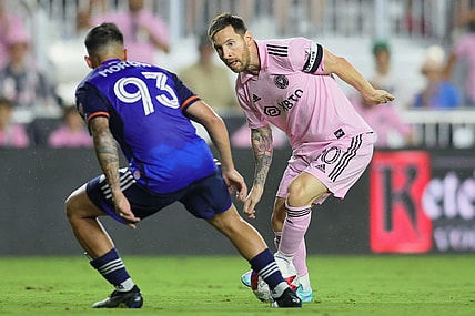 Oct 7, 2023; Fort Lauderdale, Florida, USA; Inter Miami CF forward Lionel Messi (10) dribbles the ball against FC Cincinnati midfielder Junior Moreno (93) during the second half at DRV PNK Stadium. Mandatory Credit: Sam Navarro-USA TODAY Sports