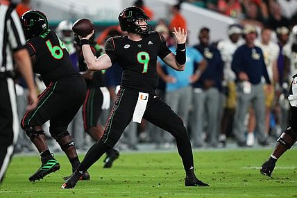 Oct 7, 2023; Miami Gardens, Florida, USA; Miami Hurricanes quarterback Tyler Van Dyke (9) attempts a pass against the Georgia Tech Yellow Jackets in the first half at Hard Rock Stadium. Mandatory Credit: Jasen Vinlove-USA TODAY Sports