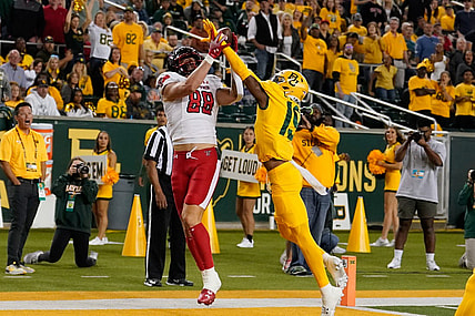 Oct 7, 2023; Waco, Texas, USA; Texas Tech Red Raiders tight end Baylor Cupp (88) makes a touchdown catch against Baylor Bears cornerback Caden Jenkins (19) during the first half at McLane Stadium. Mandatory Credit: Chris Jones-USA TODAY Sports
