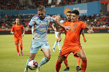 Oct 7, 2023; Houston, Texas, USA; Colorado Rapids midfielder Sam Nicholson (28) dribbles against Houston Dynamo defender Franco Escobar (2) at Shell Energy Stadium. Mandatory Credit: Dustin Safranek-USA TODAY Sports