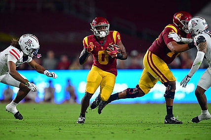 Oct 7, 2023; Los Angeles, California, USA; Southern California Trojans running back MarShawn Lloyd (0) runs the ball against the Arizona Wildcats during the first half at Los Angeles Memorial Coliseum. Mandatory Credit: Gary A. Vasquez-USA TODAY Sports