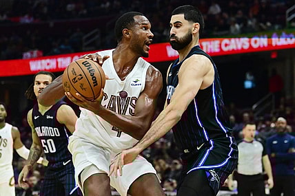 Oct 12, 2023; Cleveland, Ohio, USA; Cleveland Cavaliers forward Evan Mobley (4) drives to the basket against Orlando Magic center Goga Bitadze (35) during the second half at Rocket Mortgage FieldHouse. Mandatory Credit: Ken Blaze-USA TODAY Sports
