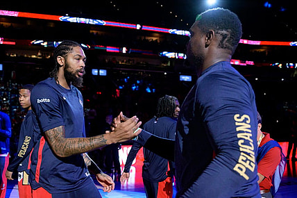 Oct 10, 2023; New Orleans, Louisiana, USA; New Orleans Pelicans forward Brandon Ingram, left, greets New Orleans Pelicans forward Zion Williamson during introductions before a game against the Orlando Magic at the Smoothie King Center. Mandatory Credit: Matthew Hinton-USA TODAY Sports