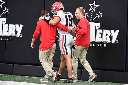 Oct 14, 2023; Nashville, Tennessee, USA; Georgia Bulldogs tight end Brock Bowers (19) walks off the field after an injury during the first half against the Vanderbilt Commodores at FirstBank Stadium. Mandatory Credit: Christopher Hanewinckel-USA TODAY Sports