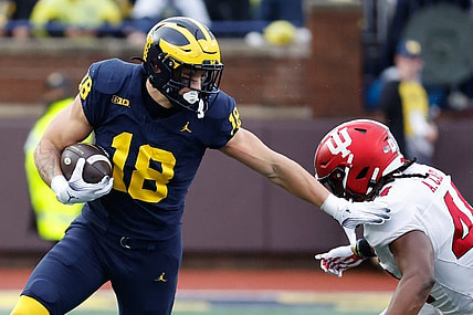 Oct 14, 2023; Ann Arbor, Michigan, USA; Michigan Wolverines tight end Colston Loveland (18) runs the ball in the first half against the Indiana Hoosiers at Michigan Stadium. Mandatory Credit: Rick Osentoski-USA TODAY Sports