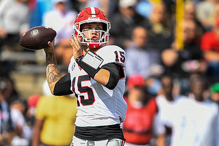 Oct 14, 2023; Nashville, Tennessee, USA;  Georgia Bulldogs quarterback Carson Beck (15) throws the ball against the Vanderbilt Commodores during the first half at FirstBank Stadium. Mandatory Credit: Steve Roberts-USA TODAY Sports