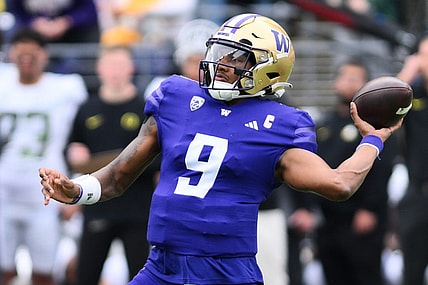 Oct 14, 2023; Seattle, Washington, USA; Washington Huskies quarterback Michael Penix Jr. (9) passes the ball against the Oregon Ducks during the first half at Alaska Airlines Field at Husky Stadium. Mandatory Credit: Steven Bisig-USA TODAY Sports