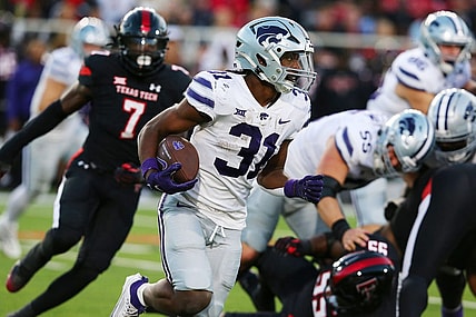 Oct 14, 2023; Lubbock, Texas, USA;  Kansas State Wildcats running back Dj Giddens (31) rushes against the Texas Tech Red Raiders in the first half at Jones AT&T Stadium and Cody Campbell Field. Mandatory Credit: Michael C. Johnson-USA TODAY Sports
