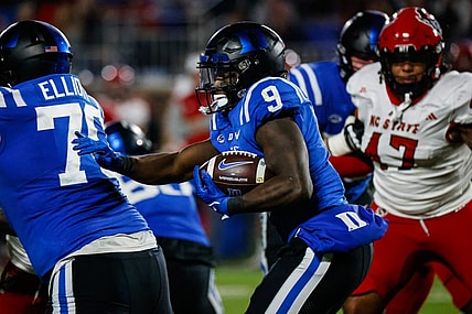 Oct 14, 2023; Durham, North Carolina, USA; Duke Blue Devils running back Jaquez Moore (9) runs with the football during the first half of the game against North Carolina State Wolfpack at Wallace Wade Stadium. Mandatory Credit: Jaylynn Nash-USA TODAY Sports