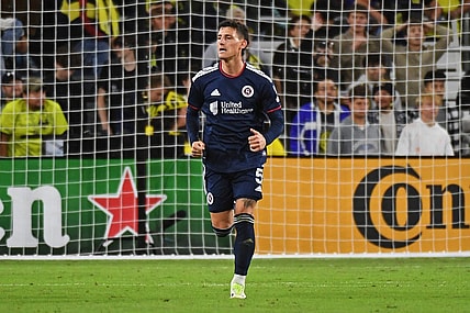 Oct 14, 2023; Nashville, Tennessee, USA; New England Revolution forward Tom  s Chancalay (5) celebrates after scoring a goal against the Nashville SC during the second half at Geodis Park. Mandatory Credit: Christopher Hanewinckel-USA TODAY Sports