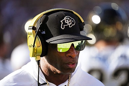 Deion Sanders walks the sidelines as the Colorado plays Arizona State at Mountain America Stadium.