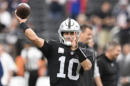 Oct 15, 2023; Paradise, Nevada, USA; Las Vegas Raiders quarterback Jimmy Garoppolo (10) warms up against the New England Patriots at Allegiant Stadium. Mandatory Credit: Candice Ward-USA TODAY Sports