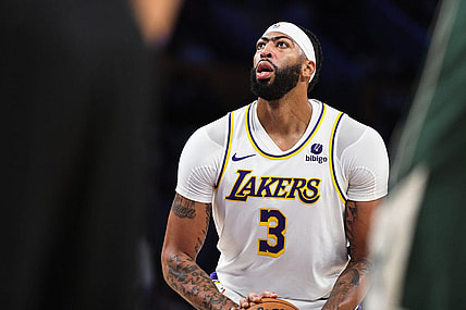 Oct 15, 2023; Los Angeles, California, USA; Los Angeles Lakers forward Anthony Davis (3) shoots a free-throw against the Milwaukee Bucks in the second quarter at Crypto.com Arena. Mandatory Credit: Jonathan Hui-USA TODAY Sports