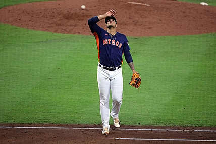 Oct 16, 2023; Houston, Texas, USA; Houston Astros relief pitcher Bryan Abreu (52) reacts in the eighth inning against the Texas Rangers during game two of the ALCS for the 2023 MLB playoffs at Minute Maid Park. Mandatory Credit: Erik Williams-USA TODAY Sports