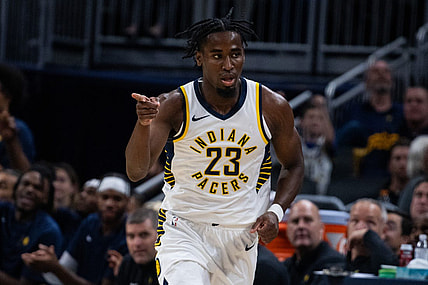 Oct 16, 2023; Indianapolis, Indiana, USA; Indiana Pacers forward Aaron Nesmith (23) celebrates a made three point basket in the second quarter against the Atlanta Hawks at Gainbridge Fieldhouse. Mandatory Credit: Trevor Ruszkowski-USA TODAY Sports