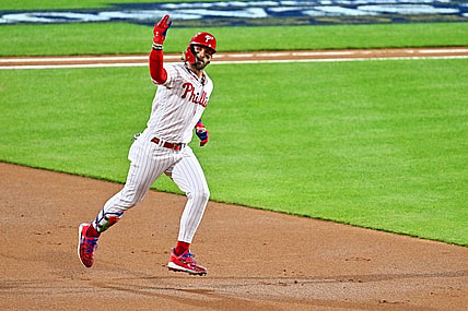 Oct 16, 2023; Philadelphia, Pennsylvania, USA; Philadelphia Phillies first baseman Bryce Harper (3) hits a solo home run during the first inning against the Arizona Diamondbacks in game one of the NLCS for the 2023 MLB playoffs at Citizens Bank Park. Mandatory Credit: Kyle Ross-USA TODAY Sports