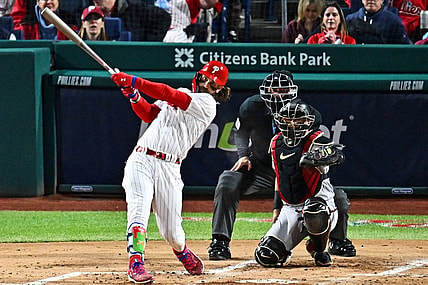 Oct 16, 2023; Philadelphia, Pennsylvania, USA; Philadelphia Phillies first baseman Bryce Harper (3) hits a solo home run during the first inning against the Arizona Diamondbacks in game one of the NLCS for the 2023 MLB playoffs at Citizens Bank Park. Mandatory Credit: Kyle Ross-USA TODAY Sports