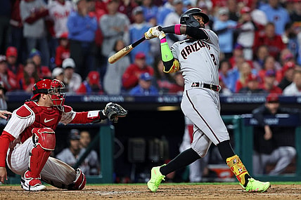 Oct 16, 2023; Philadelphia, Pennsylvania, USA; Arizona Diamondbacks shortstop Geraldo Perdomo (2) hits a two run home run during the sixth inning against the Philadelphia Phillies in game one of the NLCS for the 2023 MLB playoffs at Citizens Bank Park. Mandatory Credit: Bill Streicher-USA TODAY Sports