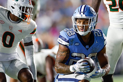 Oct 14, 2023; Chapel Hill, North Carolina, USA; North Carolina Tar Heels running back Omarion Hampton (28) after a run against the Miami Hurricanes in the second half at Kenan Memorial Stadium. Mandatory Credit: Nell Redmond-USA TODAY Sports