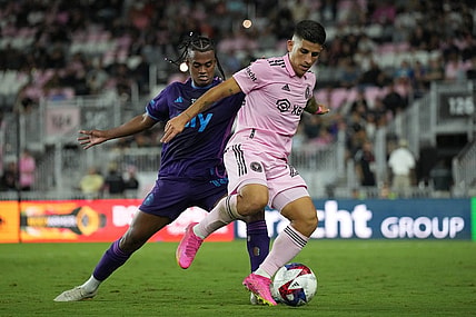 Oct 18, 2023; Fort Lauderdale, Florida, USA; Inter Miami forward Nicolas Stefanelli (22) moves the ball against Charlotte FC forward Kerwin Vargas (18) during the first half at DRV PNK Stadium. Mandatory Credit: Jim Rassol-USA TODAY Sports
