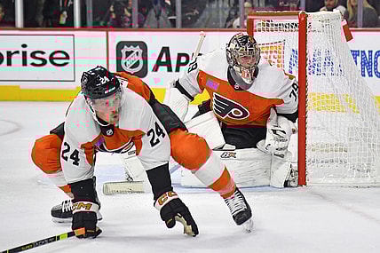 Oct 19, 2023; Philadelphia, Pennsylvania, USA; Philadelphia Flyers defenseman Nick Seeler (24) defends with goaltender Carter Hart (79) against the Edmonton Oilers during the second period at Wells Fargo Center. Mandatory Credit: Eric Hartline-USA TODAY Sports