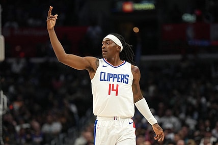 Oct 19, 2023; Los Angeles, California, USA; LA Clippers guard Terance Mann (14) celebrates against the Denver Nuggets in the first half at Crypto.com Arena. Mandatory Credit: Kirby Lee-USA TODAY Sports