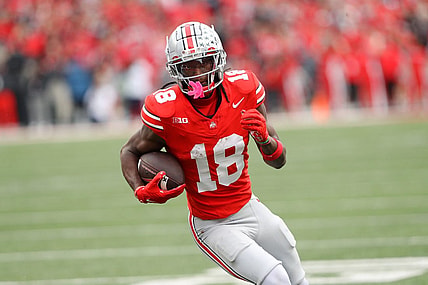Oct 21, 2023; Columbus, Ohio, USA;  Ohio State Buckeyes wide receiver Marvin Harrison Jr. (18) scores a touchdown against the Penn State Nittany Lions during the fourth quarter at Ohio Stadium. Mandatory Credit: Joseph Maiorana-USA TODAY Sports
