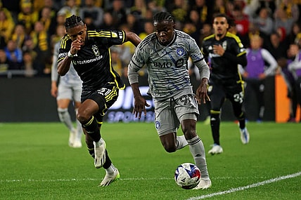 Oct 21, 2023; Columbus, Ohio, USA; CF Montreal forward Kwadwo Opoku (90) controls the ball against Columbus Crew defender Steven Moreira (31) during the second half at Lower.com Field. Mandatory Credit: Trevor Ruszkowski-USA TODAY Sports