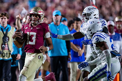 Florida State Seminoles quarterback Jordan Travis (13) runs out of bounds. The Florida State Seminoles defeated the Duke Blue Devils 38-20 on Saturday, Oct. 21, 2023.