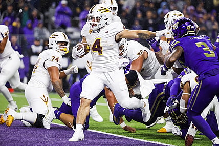 Oct 21, 2023; Seattle, Washington, USA; Arizona State Sun Devils running back Cameron Skattebo (4) rushes for a touchdown against the Washington Huskies during the second quarter at Alaska Airlines Field at Husky Stadium. Mandatory Credit: Joe Nicholson-USA TODAY Sports