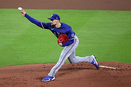 Oct 22, 2023; Houston, Texas, USA; Texas Rangers starting pitcher Nathan Eovaldi (17) throws a pitch against the Houston Astros in the first inning during game six of the ALCS for the 2023 MLB playoffs at Minute Maid Park. Mandatory Credit: Erik Williams-USA TODAY Sports