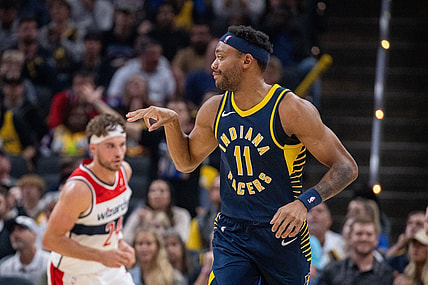 Oct 25, 2023; Indianapolis, Indiana, USA; Indiana Pacers forward Bruce Brown (11) celebrates a made three point basket in the second quarter against the Washington Wizards at Gainbridge Fieldhouse. Mandatory Credit: Trevor Ruszkowski-USA TODAY Sports