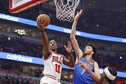 Oct 25, 2023; Chicago, Illinois, USA; Chicago Bulls forward DeMar DeRozan (11) goes to the basket against Oklahoma City Thunder forward Chet Holmgren (7) during the first half of a basketball game at United Center. Mandatory Credit: Kamil Krzaczynski-USA TODAY Sports