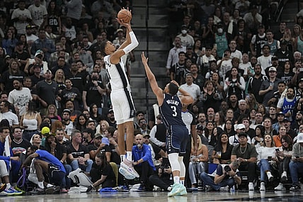 Oct 25, 2023; San Antonio, Texas, USA;  San Antonio Spurs center Victor Wembanyama (1) shoots over Dallas Mavericks forward Grant Williams (3) in the second half at the Frost Bank Center. Mandatory Credit: Daniel Dunn-USA TODAY Sports