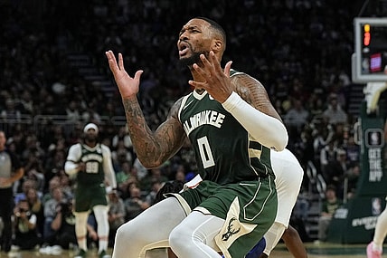 Oct 26, 2023; Milwaukee, Wisconsin, USA;  Milwaukee Bucks guard Damian Lillard (0) reacts after being called for a foul during the third quarter against the Philadelphia 76ers at Fiserv Forum. Mandatory Credit: Jeff Hanisch-USA TODAY Sports