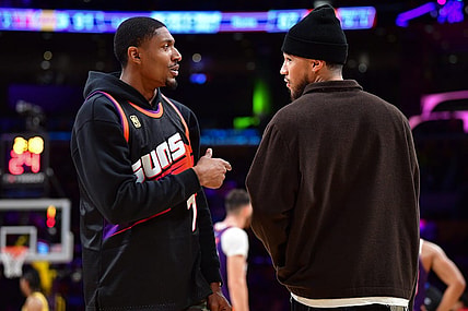 Oct 26, 2023; Los Angeles, California, USA; Phoenix Suns guard Bradley Beal (3) speaks with guard Devin Booker (1) during the second half at Crypto.com Arena. Mandatory Credit: Gary A. Vasquez-USA TODAY Sports
