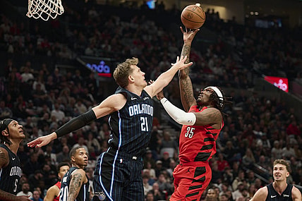 Oct 27, 2023; Portland, Oregon, USA; Portland Trail Blazers center Robert Williams III (35) shoots a basket during the first half against Orlando Magic center Moritz Wagner (21) at Moda Center. Mandatory Credit: Troy Wayrynen-USA TODAY Sports