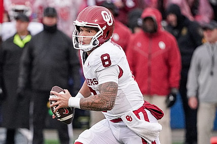 Oct 28, 2023; Lawrence, Kansas, USA; Oklahoma Sooners quarterback Dillon Gabriel (8) runs the ball against the Kansas Jayhawks during the first half at David Booth Kansas Memorial Stadium. Mandatory Credit: Denny Medley-USA TODAY Sports