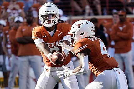 Oct 28, 2023; Austin, Texas, USA; Texas Longhorns quarterback Maalik Murphy (6) hands off to running back CJ Baxter (4) during the second half against the Brigham Young Cougars at Darrell K Royal-Texas Memorial Stadium. Mandatory Credit: Scott Wachter-USA TODAY Sports